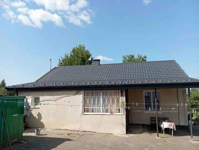 Будинок під ключ з чотирисхилим дахом